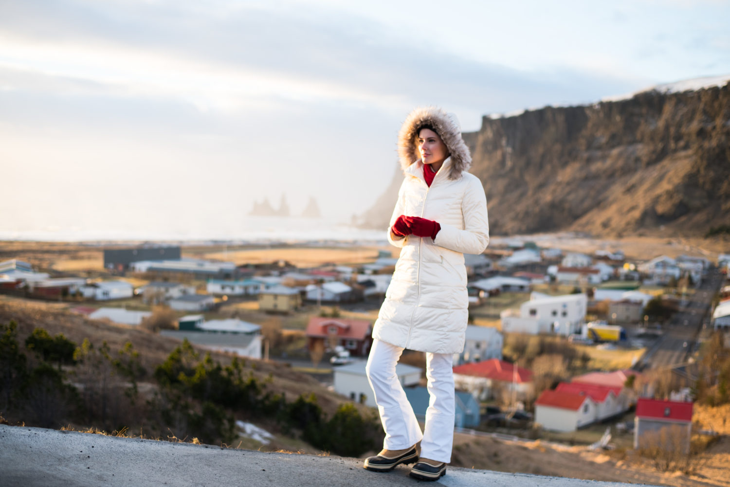 Miss USA 2011 Alyssa Campanella of The A List blog wearing Ellen Tracy faux fur coat and Sorel Caribou boots in Iceland