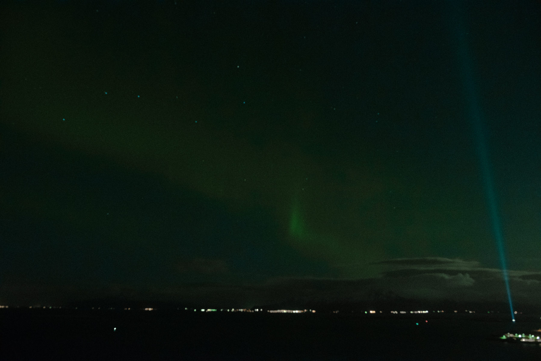 Torrance Coombs and Alyssa Campanella of The A List blog view the Northern Lights at Tower Suites Reykjavik in Iceland