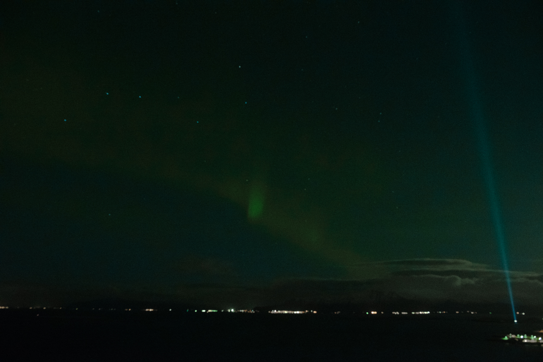 Torrance Coombs and Alyssa Campanella of The A List blog view the Northern Lights at Tower Suites Reykjavik in Iceland