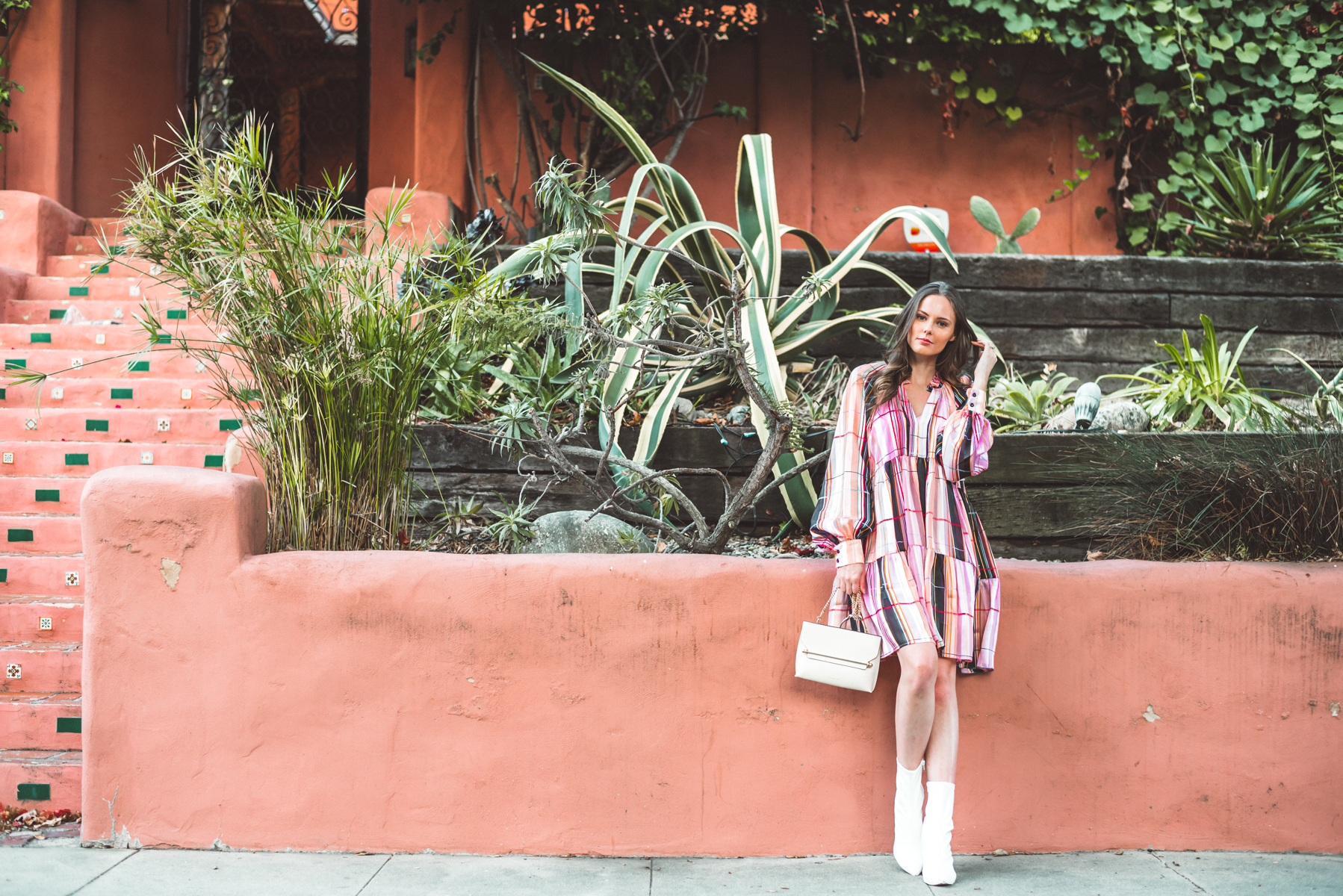Alyssa Campanella of The A List blog shares 5 Danish brands to know wearing Stine Goya Jasmine dress and Strathberry stylist bag 