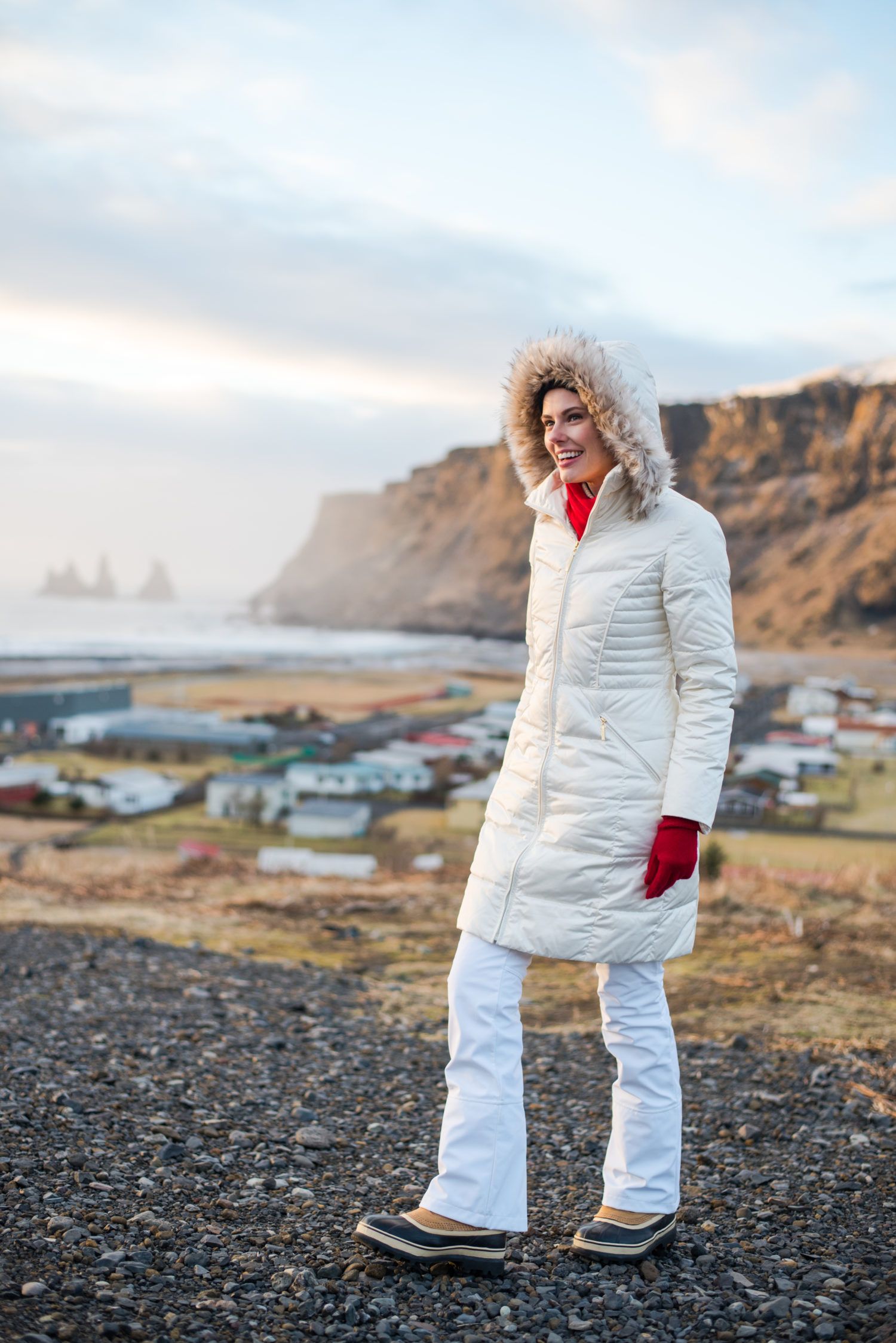 Miss USA 2011 Alyssa Campanella of The A List blog wearing Ellen Tracy faux fur coat and Sorel Caribou boots in Iceland