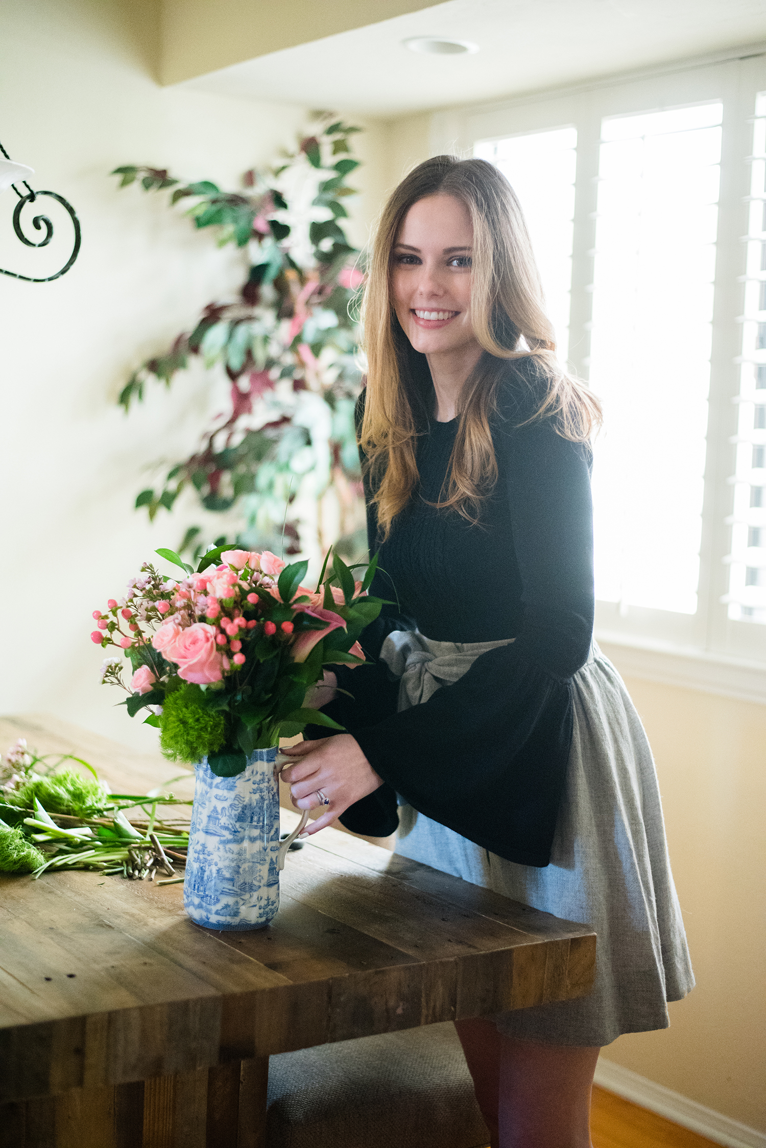 Miss USA 2011 Alyssa Campanella of The A List blog with Bouquet Bar's luxury Valentine's Day gift box in BCBG MAXAZRIA Bell Sleeve Sweater and Club Monaco Jouiette Skirt