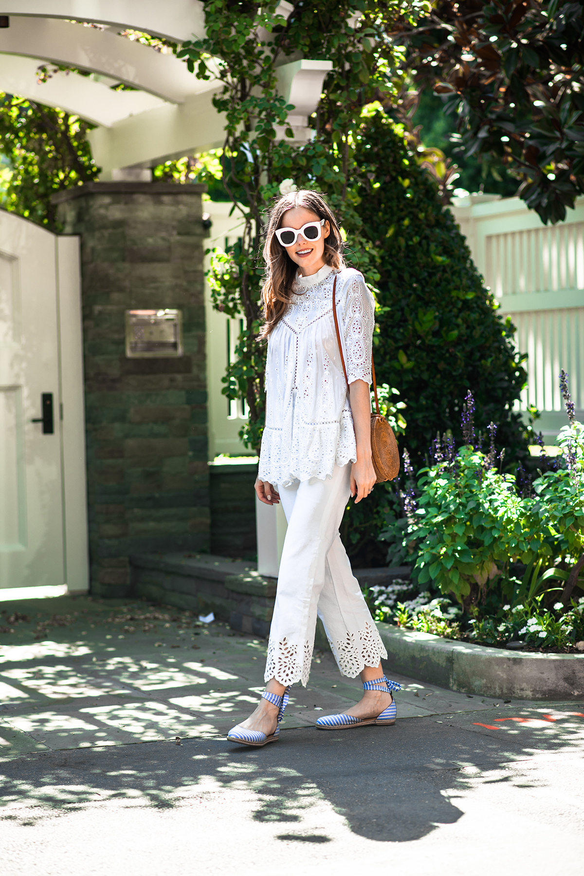 Alyssa Campanella of The A List blog wearing white eyelet Zimmermann top and Rebecca Taylor jeans and MDS Stripes Margaux NY espadrilles.