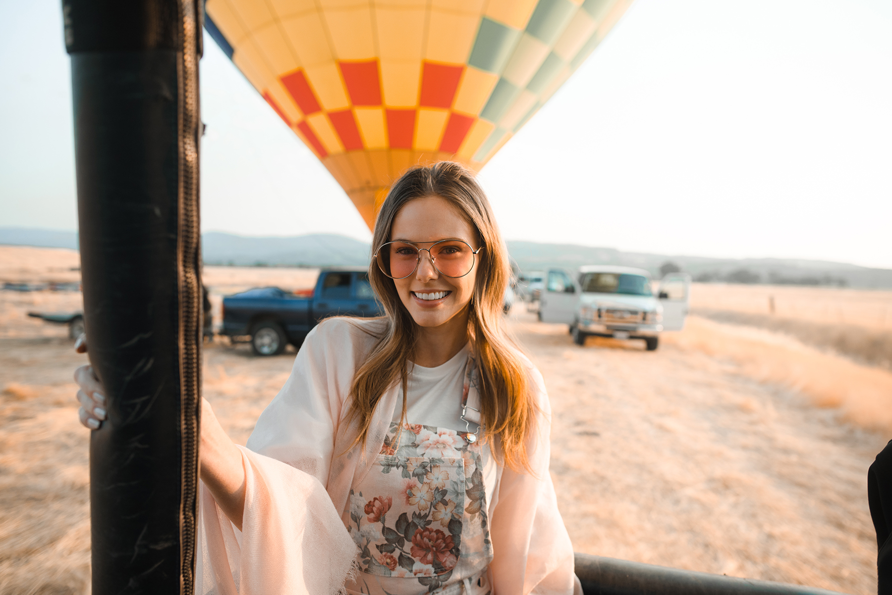 Alyssa Campanella of The A List blog visits Calistoga Balloons with Visit Napa Valley wearing Zimmerman jumpsuit and Gentle Monster Ranny sunglasses