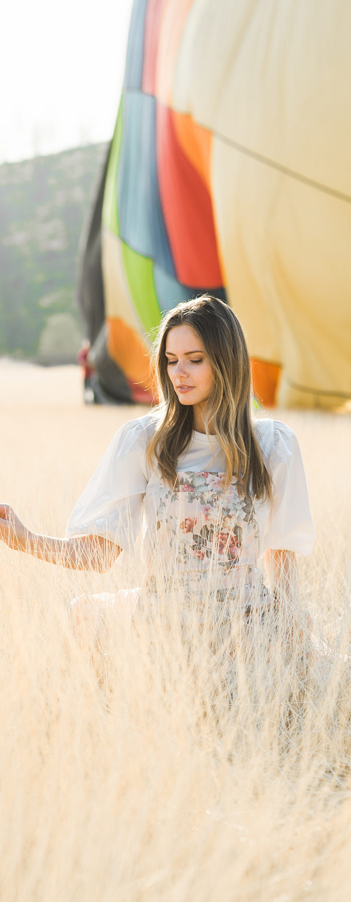 Alyssa Campanella of The A List blog visits Calistoga Balloons with Visit Napa Valley wearing Zimmerman jumpsuit and Gentle Monster Ranny sunglasses
