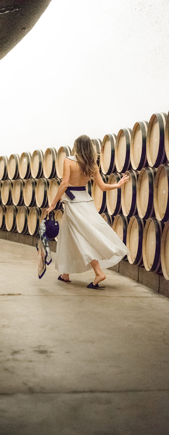 Alyssa Campanella of The A List blog visits Cade Winery with Visit Napa Valley in Calistoga wearing Gul Hurgel