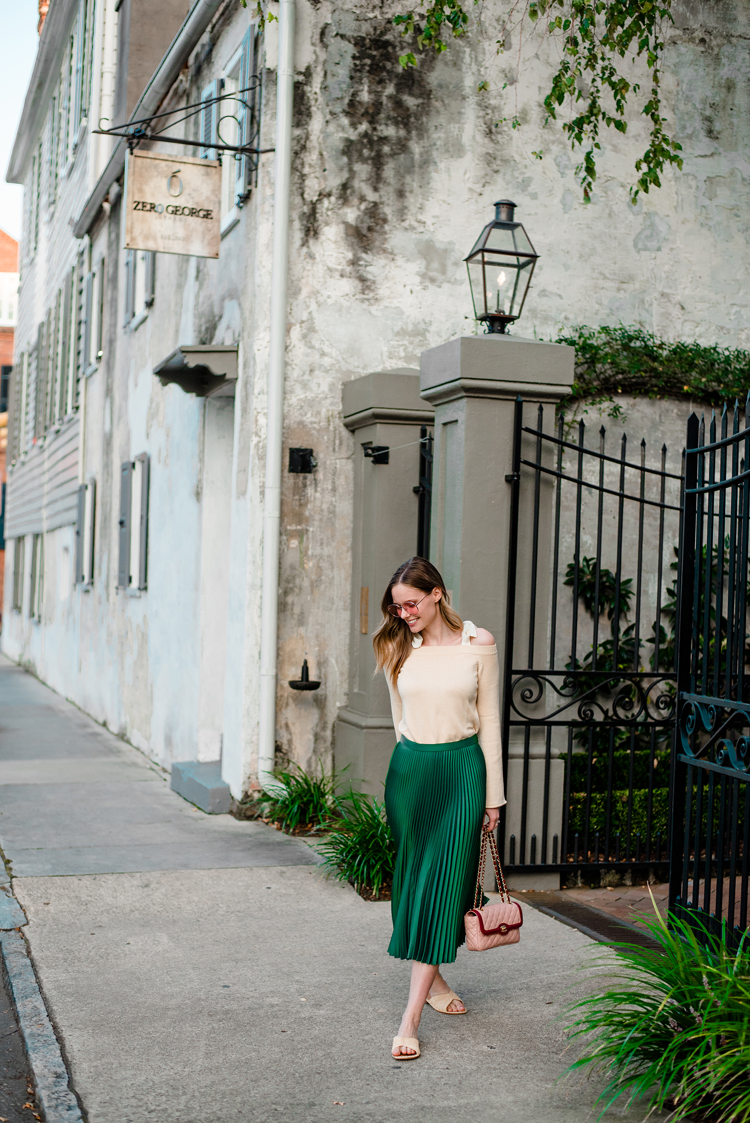 Alyssa Campanella of The A List blog's 48 Hours in Charleston itinerary wearing Club Monaco green pleated Annina skirt