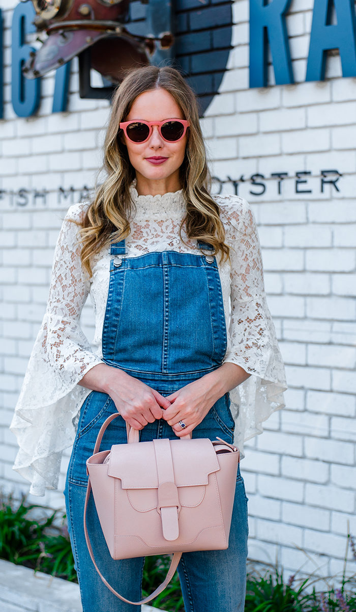 Alyssa Campanella of The A List blog's 48 Hours in Charleston dining at 167 Raw wearing Wayf Citha lace top and Senreve mini Maestra bag