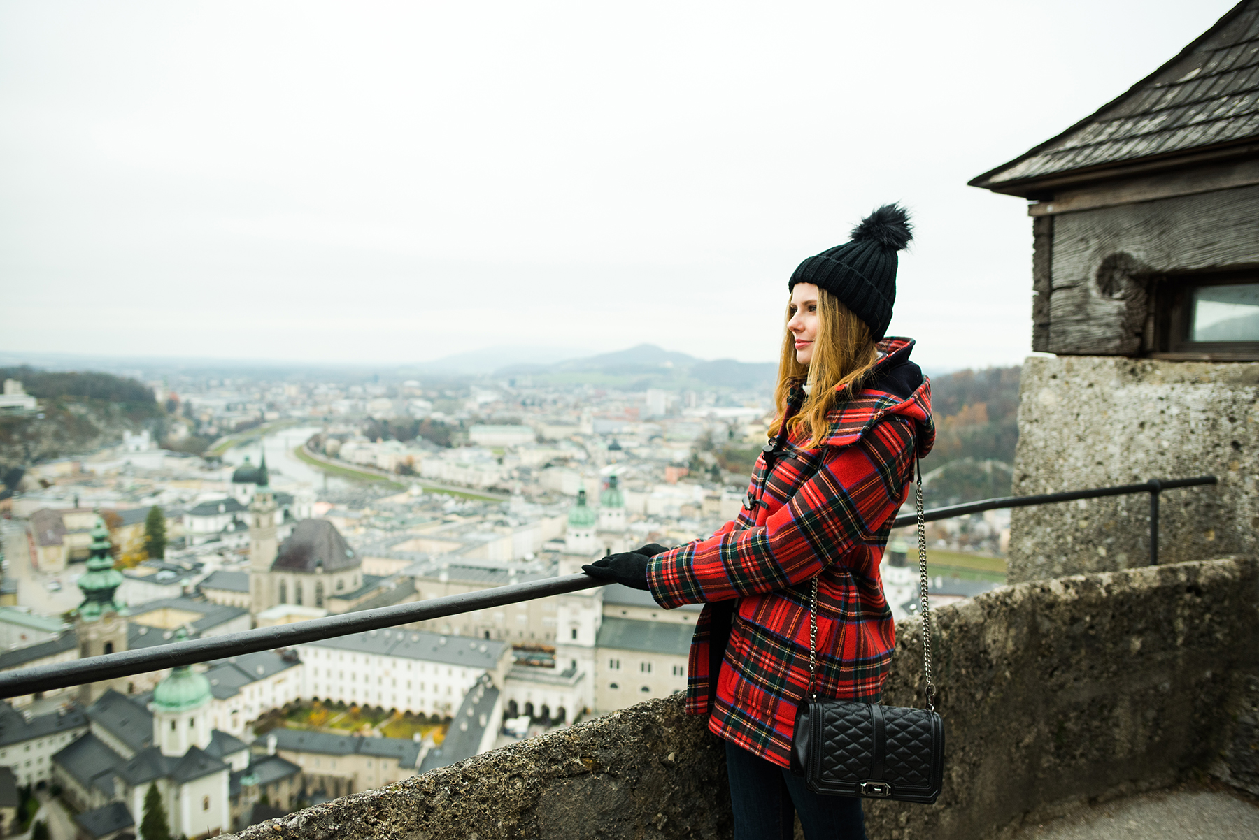 Alyssa Campanella of The A List blog sharing her favorite coats for fall and winter wearing Gloverall in Austria