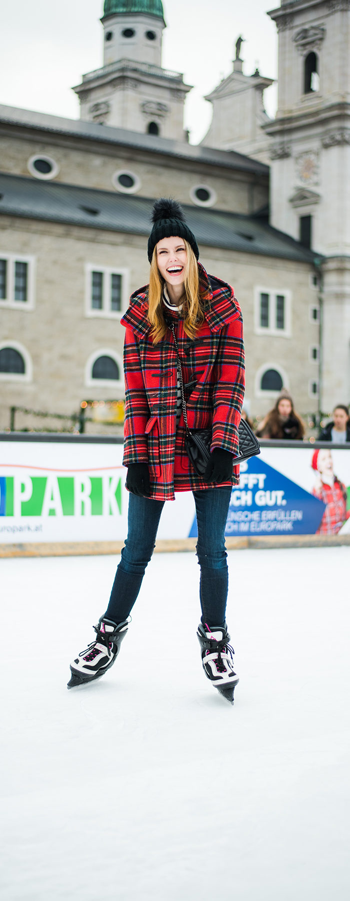 Alyssa Campanella of The A List blog sharing her favorite coats for fall and winter wearing Gloverall in Austria