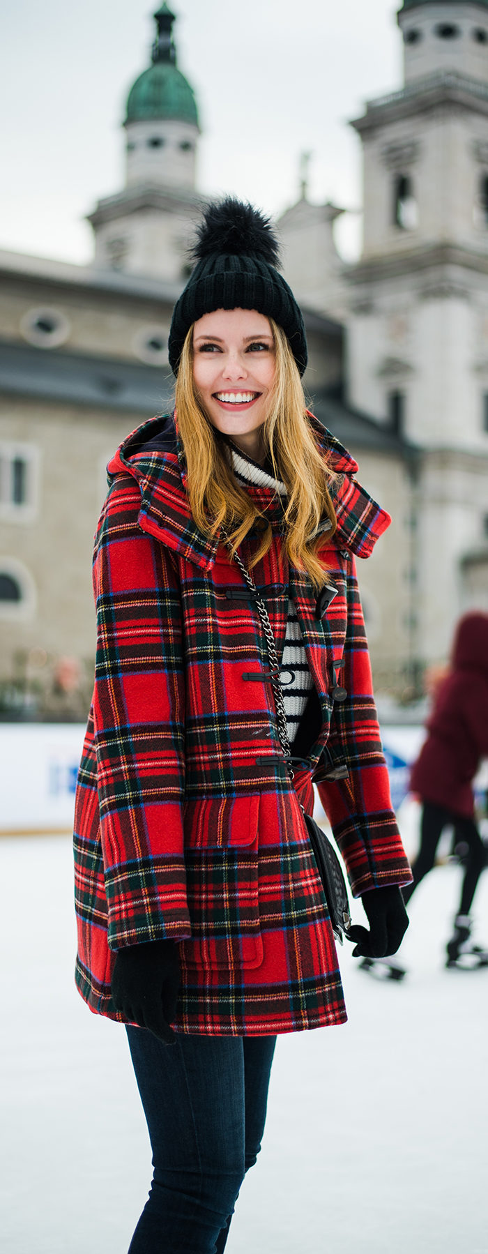 Alyssa Campanella of The A List blog sharing her favorite coats for fall and winter wearing Gloverall in Austria