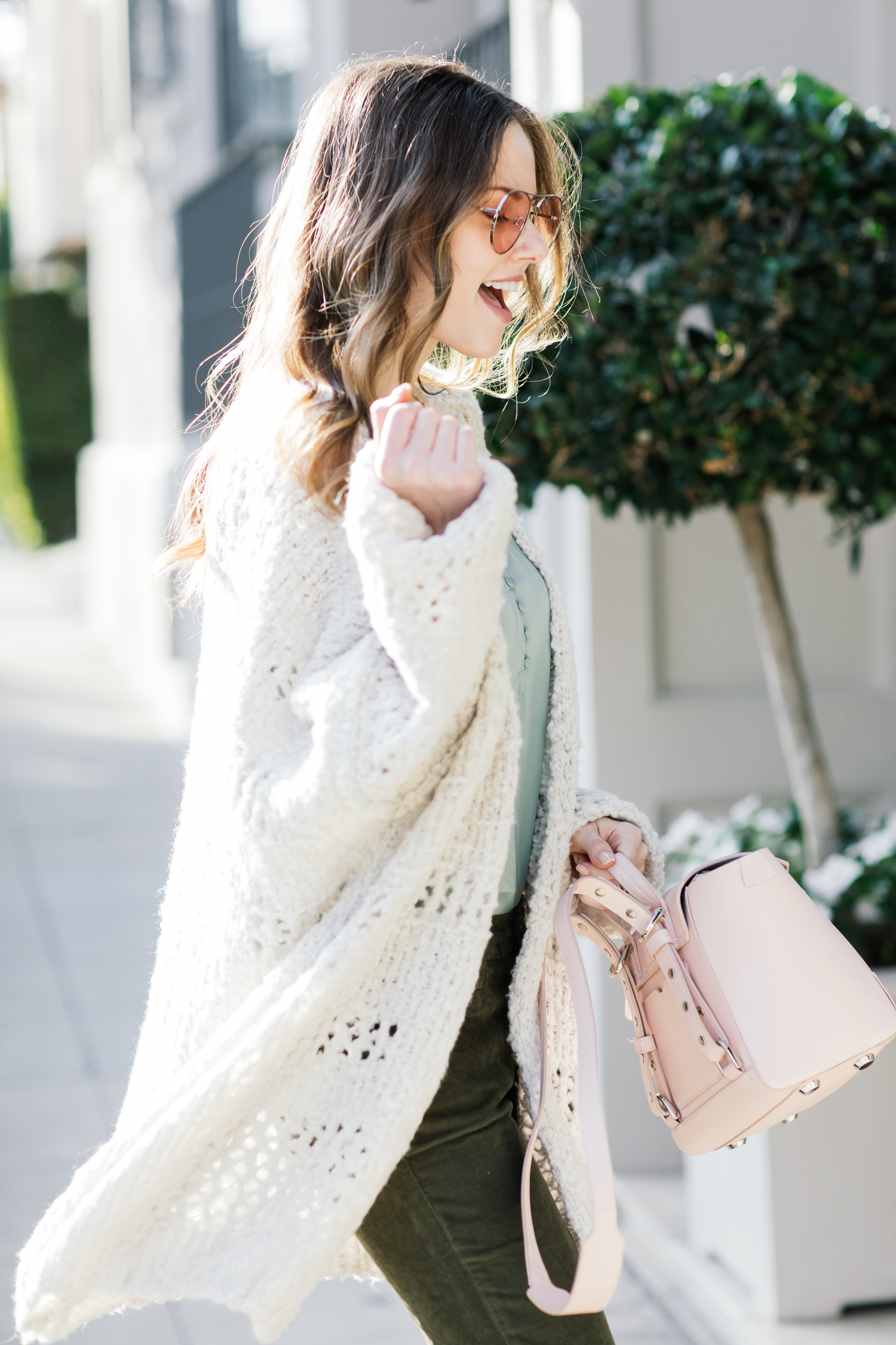Alyssa Campanella of The A List blog wearing Free People Saturday Morning comfy sweater and Current Elliott Stiletto jeans
