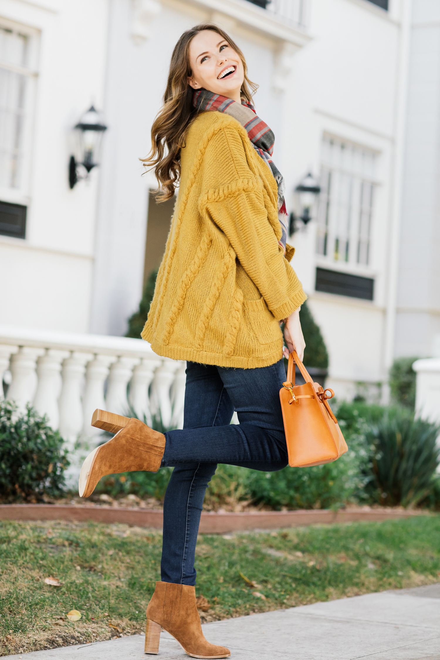 Alyssa Campanella of The A List blog wearing a cozy yellow cardigan and Joie Yara boots for fall