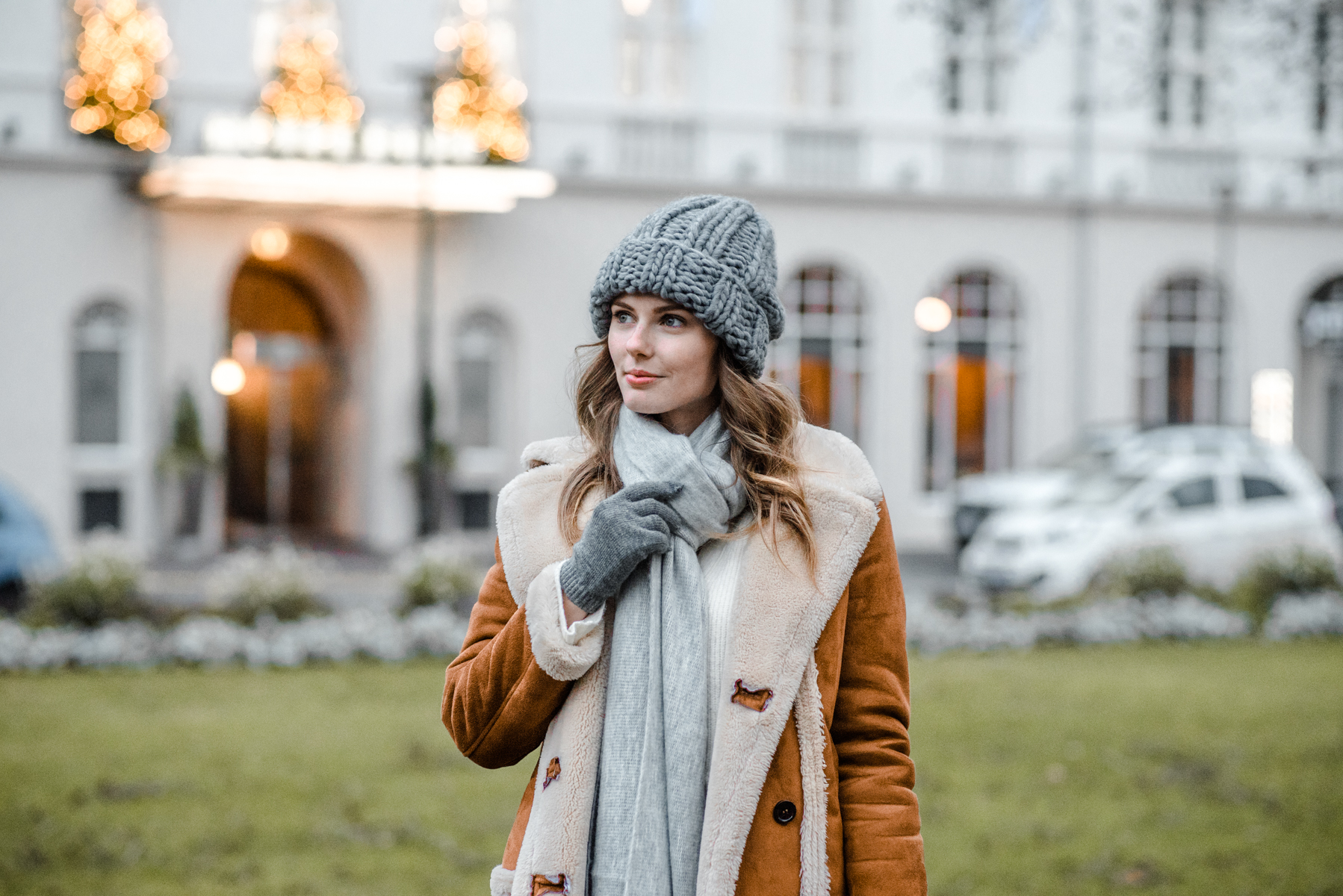 Alyssa Campanella of The A List blog visits Reykjavik, Iceland wearing Topshop Faux Shearling Coat, Clare V Alistair bag, and Stuart Weitzman 5050 boots.