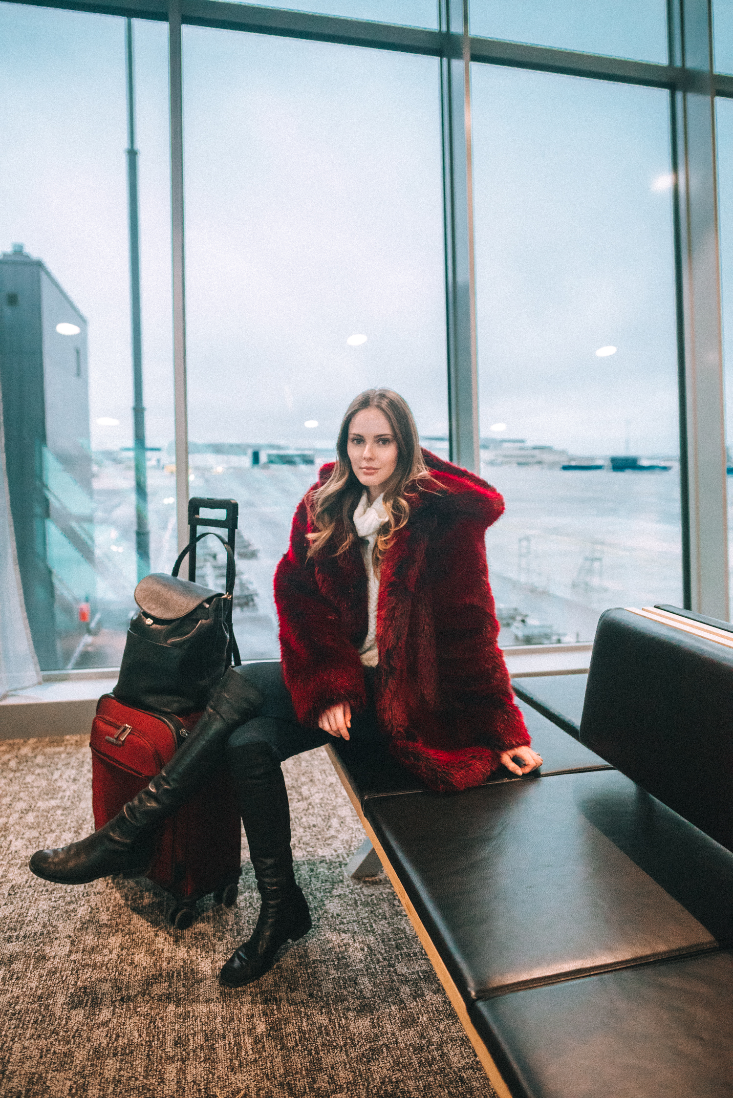 Alyssa Campanella of The A List blog flies to Finland with Finnair wearing LPA 84 coat