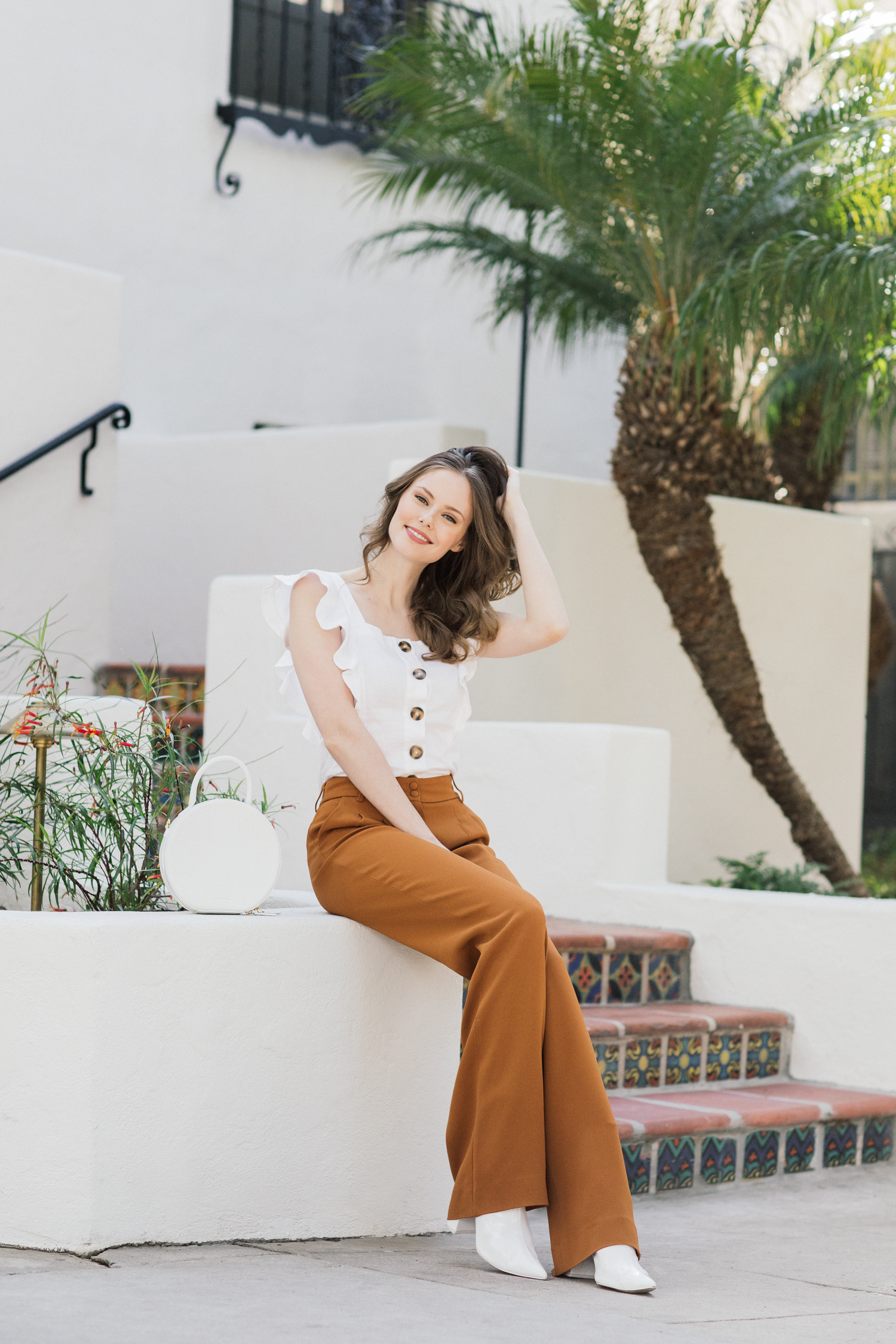 Alyssa Campanella of The A List blog wears Sezane Theo pants and LPA button up top for changing up my wardrobe