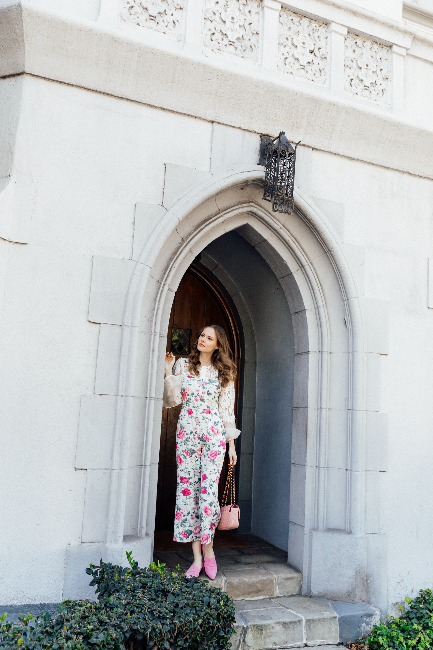 Alyssa Campanella of The A List blog encompasses spring layers wearing Majorelle haven jumpsuit and Thelma Penny Loafers