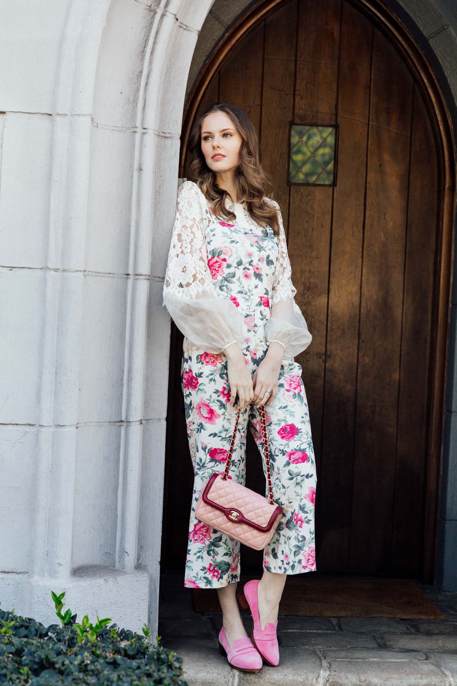 Alyssa Campanella of The A List blog encompasses spring layers wearing Majorelle haven jumpsuit and Thelma Penny Loafers