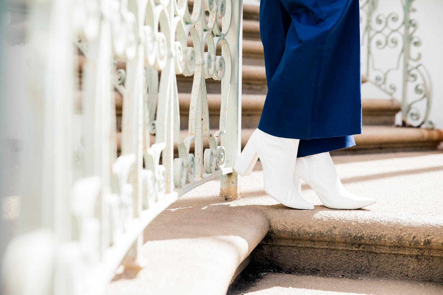 Alyssa Campanella of The A List blog shares white accessories for spring in Staud Novak pants and Mansur Gavriel white circle bag