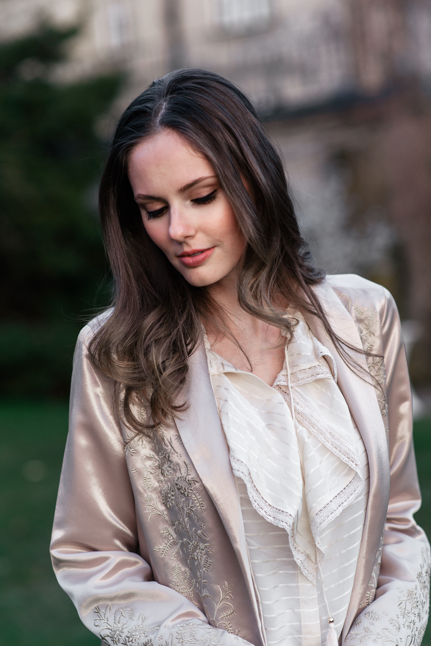 Alyssa Campanella of The A List blog wears the Maryella coat from Paige denim at the romantic Irish castle Cabra Castle in Ireland