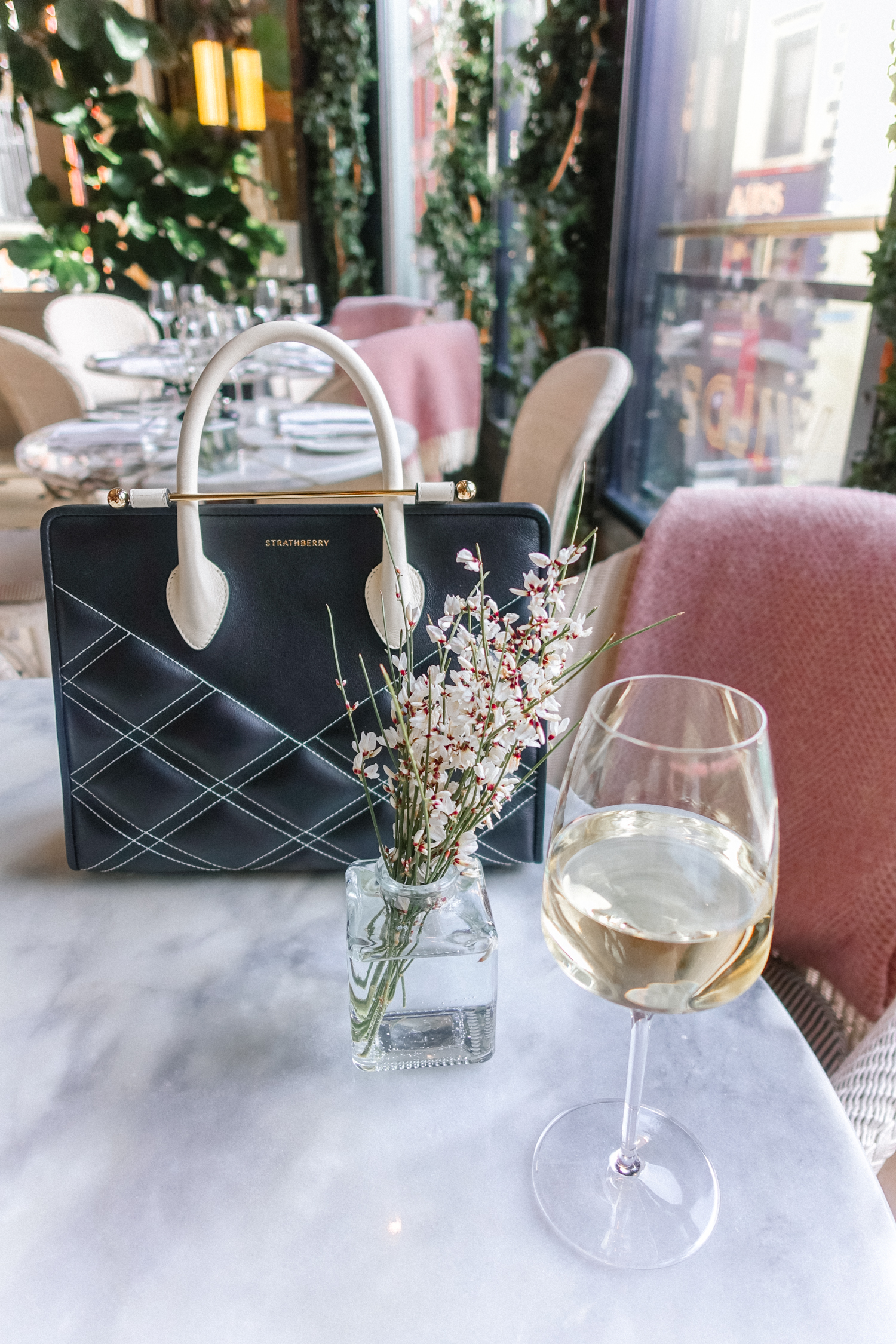 Alyssa Campanella of The A List blog visits The Westbury in Dublin, Ireland with the Strathberry Quilted Midi Tote