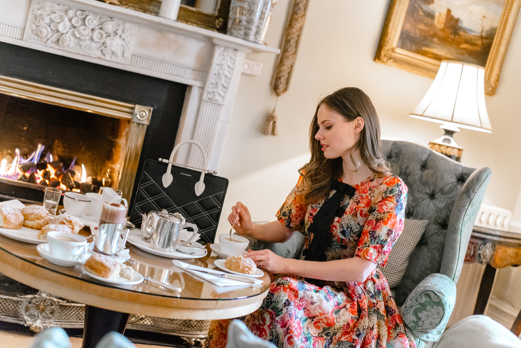 Alyssa Campanella of The A List enjoys afternoon tea at Marlfield House with the Strathberry Quilted Midi Tote Bag