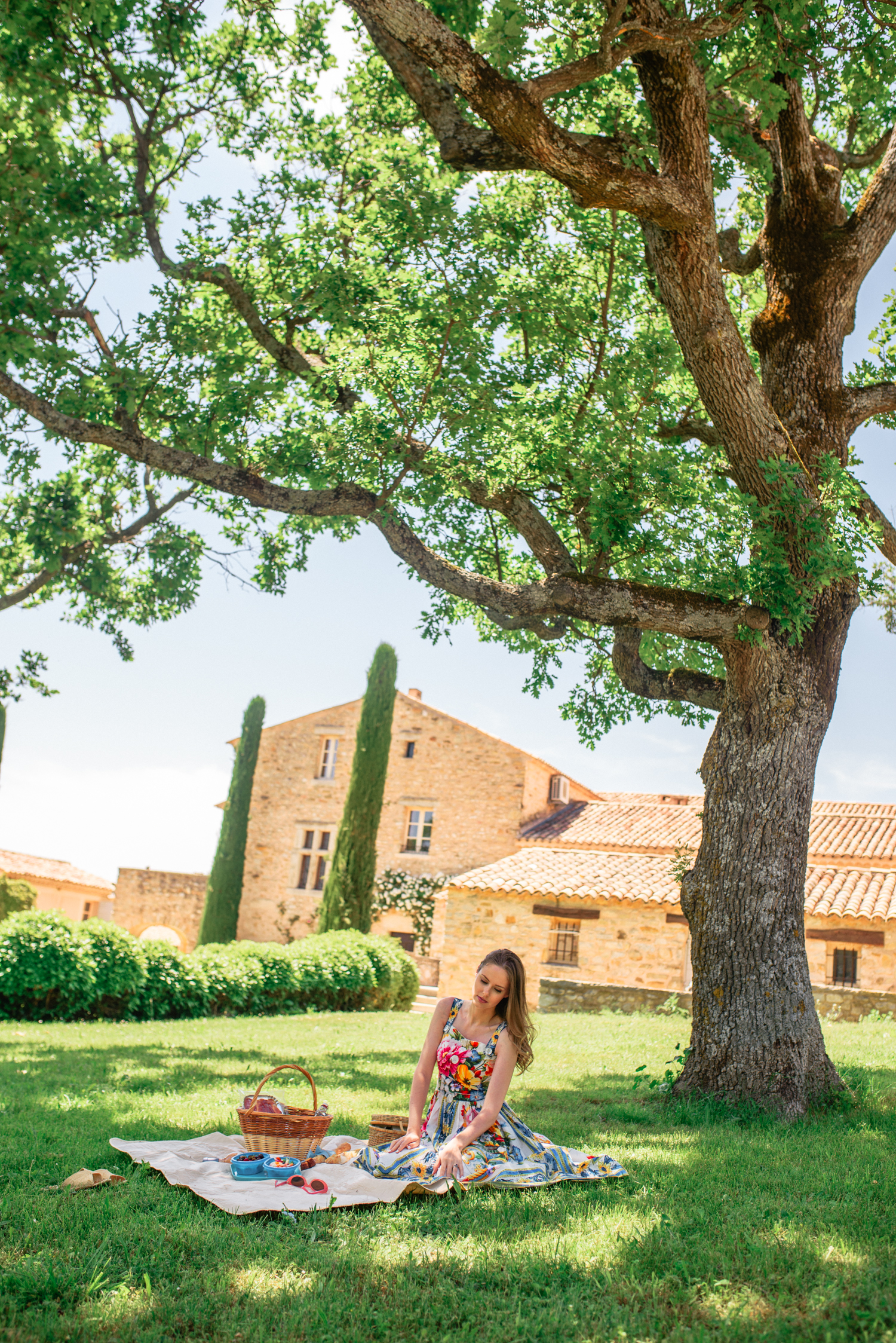 Alyssa Campanella of The A List blog visits La Verrière in Provence, France wearing Dolce & Gabbana majolica dress
