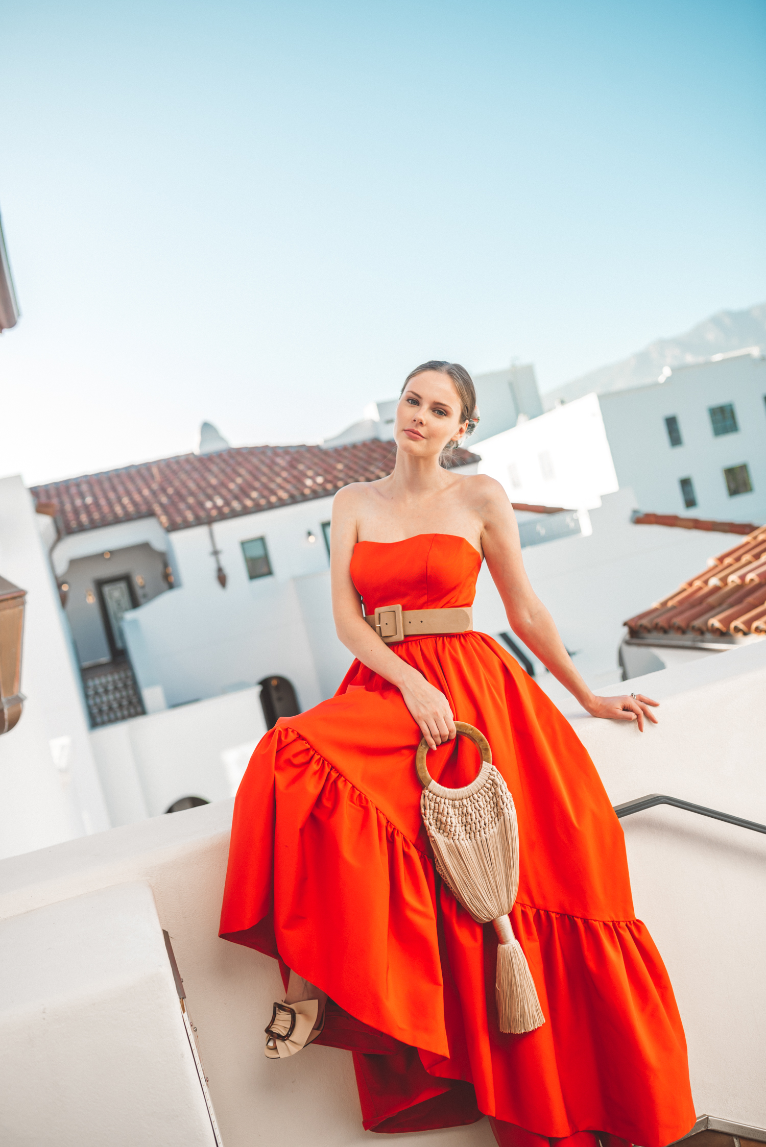 Alyssa Campanella of The A List blog visits Hotel Californian in Santa Barbara with Torrance Coombs wearing Mestiza NY Georgiana dress and Cult Gaia Angelou bag for an anniversary trip.