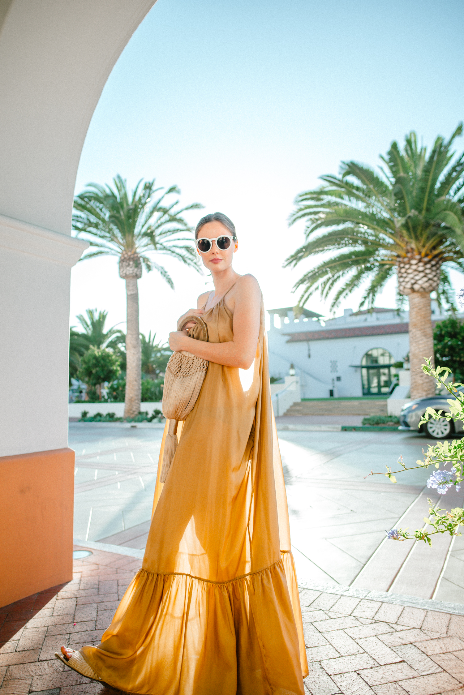 Alyssa Campanella of The A List blog visits Hotel Californian in Santa Barbara with Torrance Coombs wearing Kalita Brigitte dress and Cult Gaia Angelou bag for an anniversary trip.