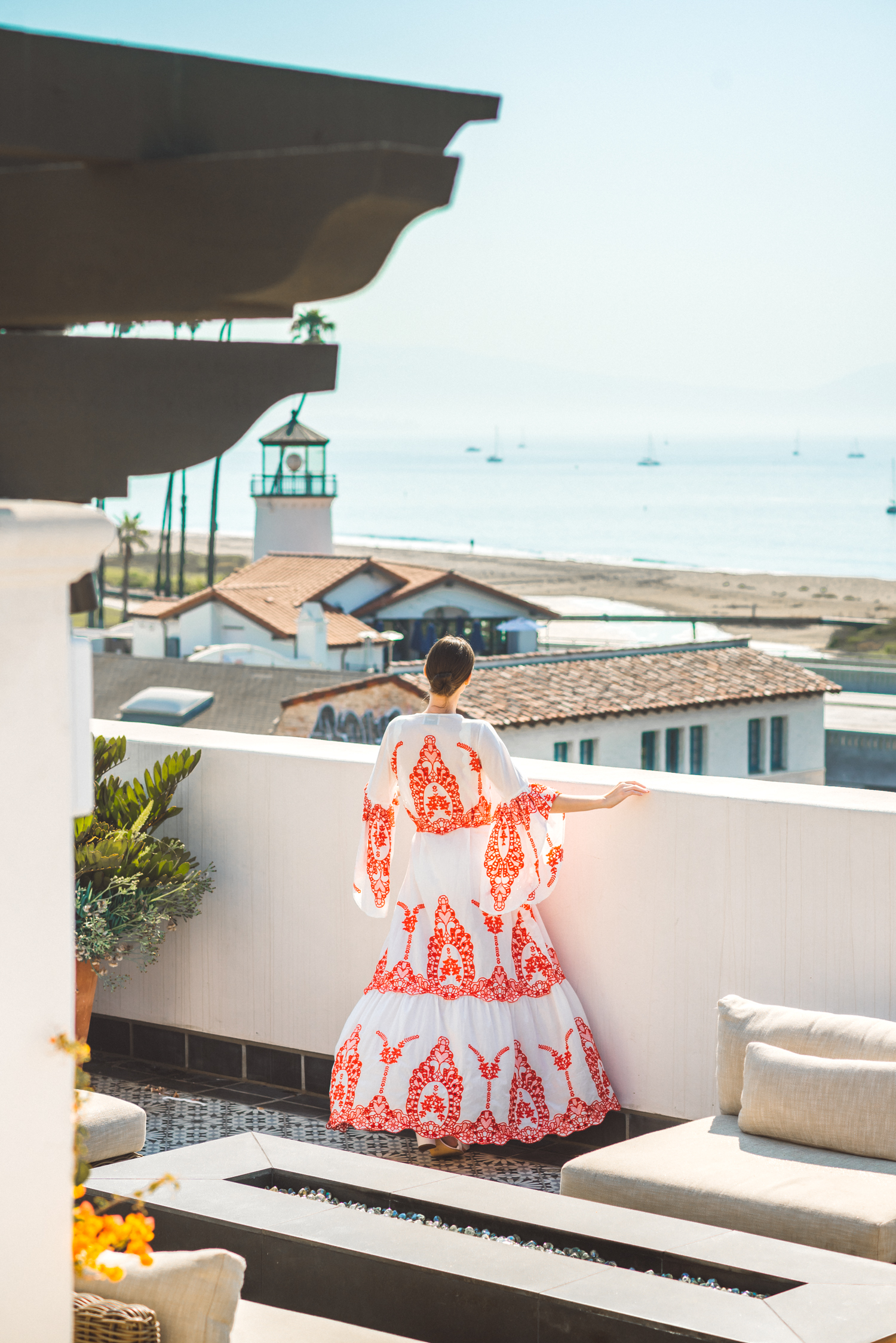 Alyssa Campanella of The A List blog visits Hotel Californian in Santa Barbara with Torrance Coombs wearing We Are Leone embroidered maxi dress for an anniversary trip.