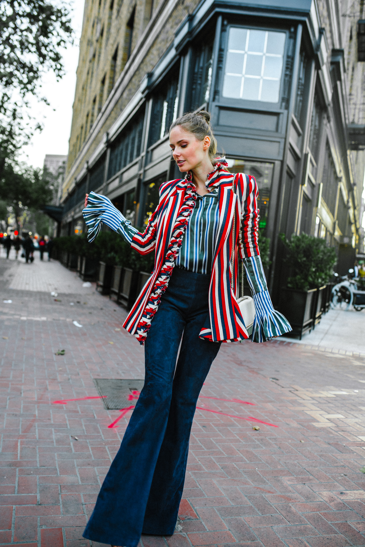 Alyssa Campanella of The A List blog travels to San Francisco with Alaska Airlines and Shopstyle wearing Maggie Marilyn I Lead From The Heart blazer, Brandon Maxwell suede pants, and Strathberry East/West bag