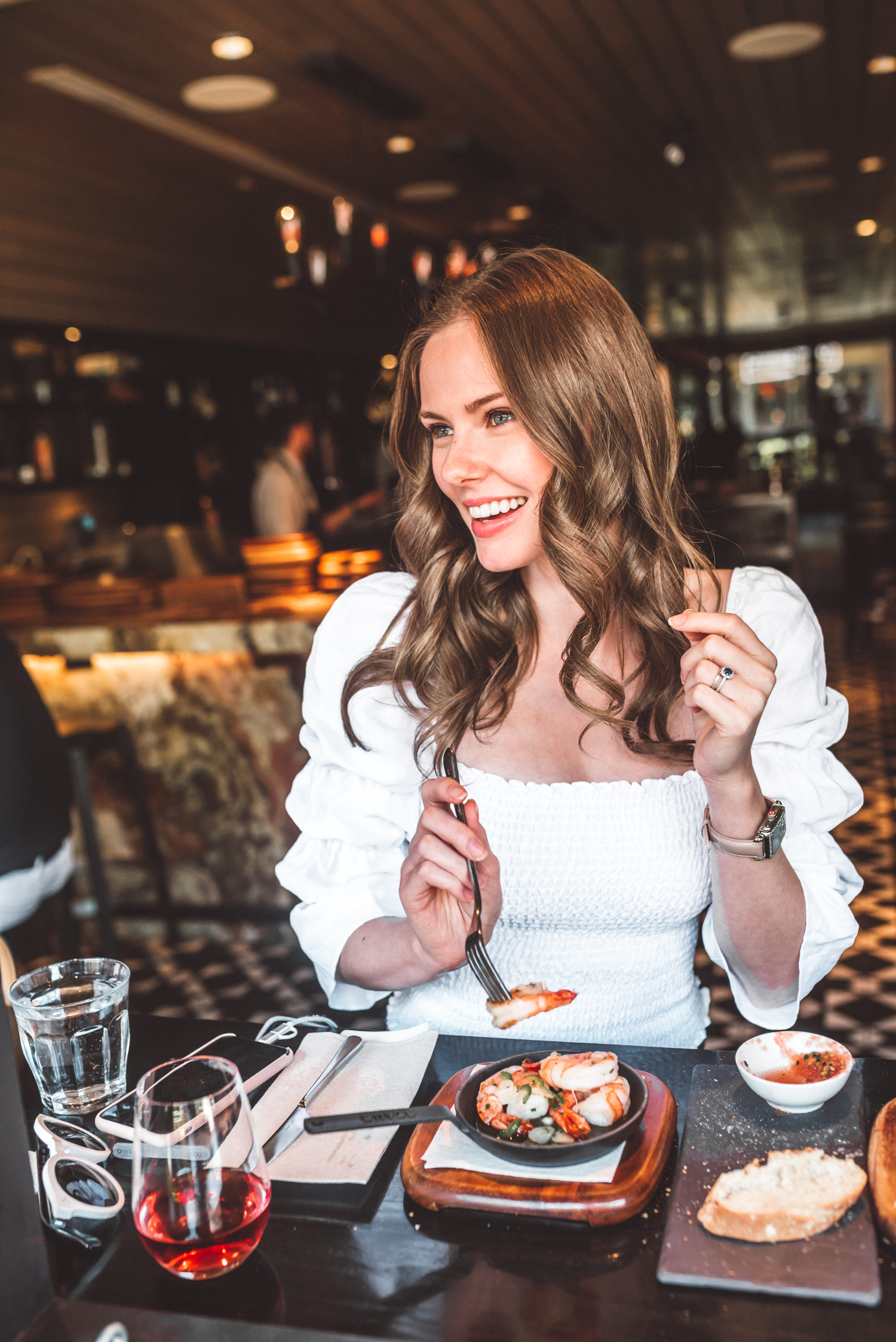 Alyssa Campanella of The A List shares her Whistler City Guide wearing Reformation Gala top and Michele Watches Diamond Deco watch at Bar Oso