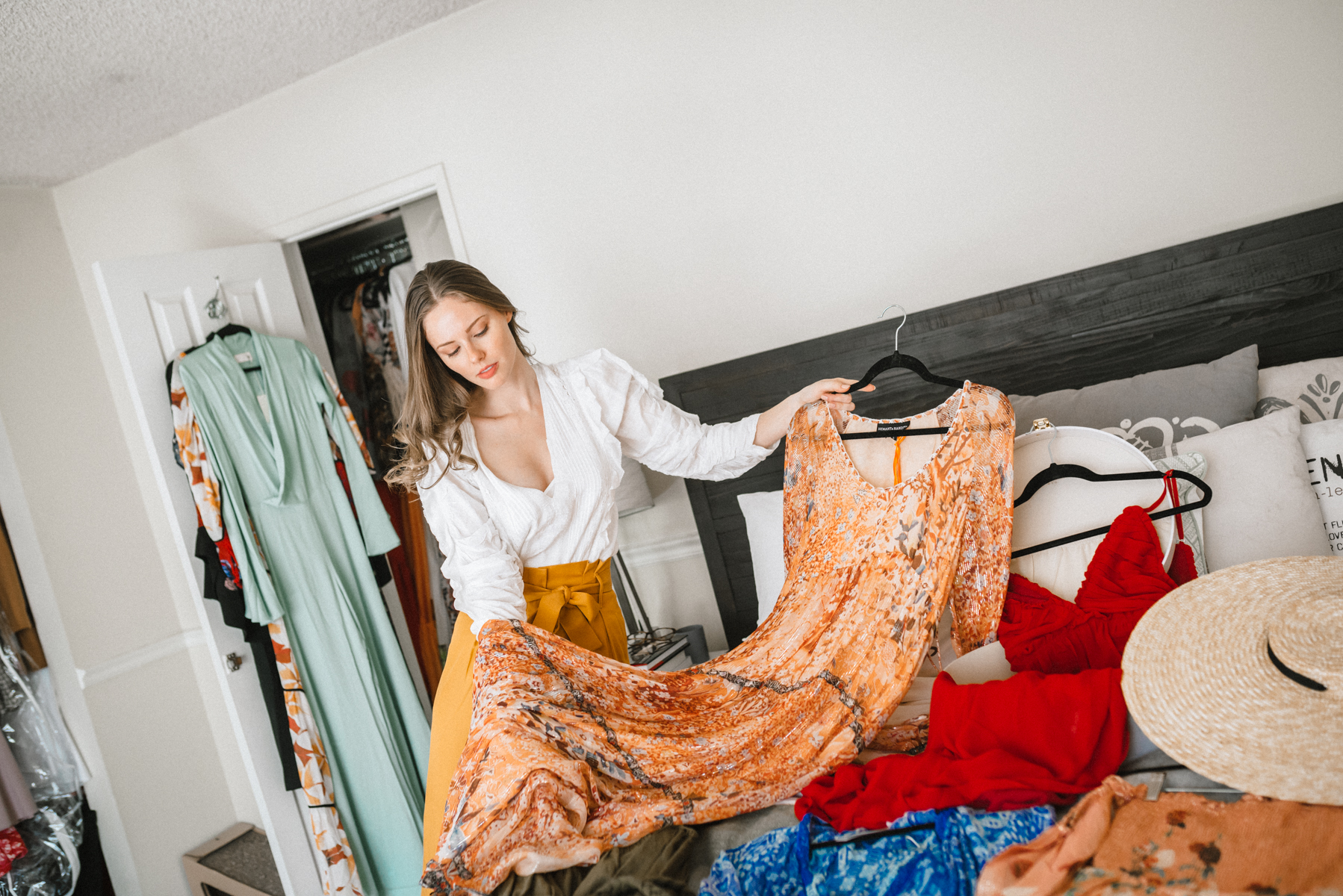 Former Miss USA 2011 Alyssa Campanella of The A List blog shares her Cayman Islands packing list with Hemant & Nandita and Jacquemus Santon hat wearing Sézane Arthur yellow pants