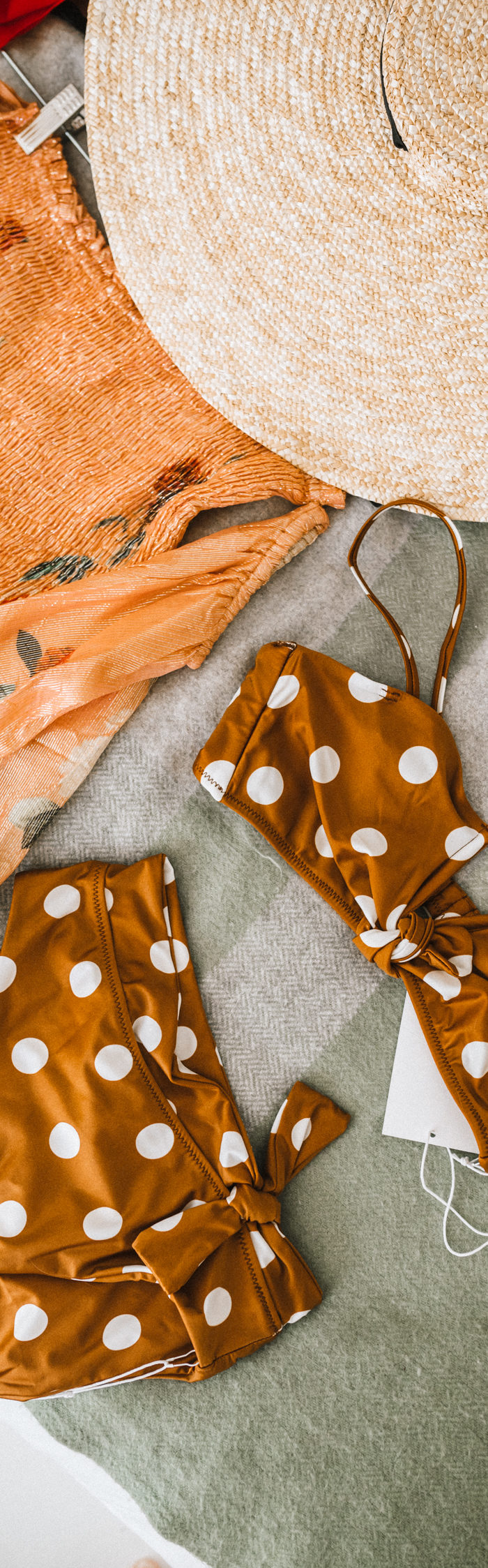 Former Miss USA 2011 Alyssa Campanella of The A List blog shares her Cayman Islands packing list with Rococo Sand off the shoulder dress and Sidway polka dot swimsuit