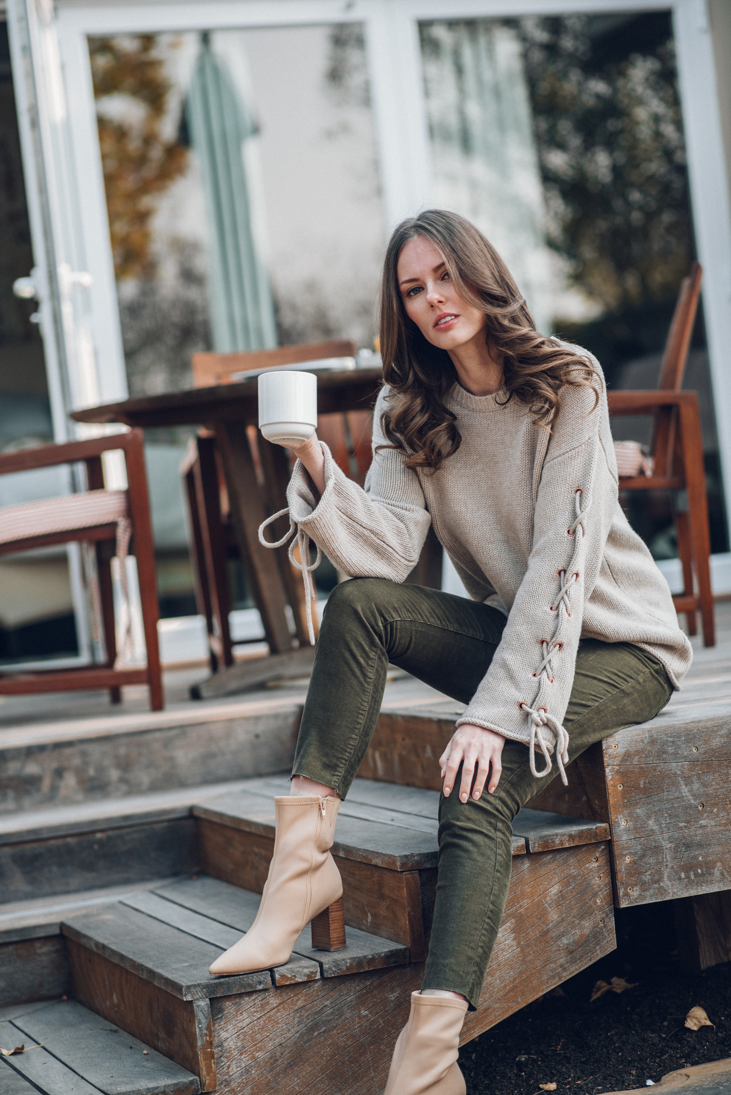 Alyssa Campanella of The A List blog visits Carneros Resort & Spa in November 2018 for cabernet season in a Harvest Cottage wearing See by Chloé lace up sleeve sweater and Jeffrey Campbell siren bootie