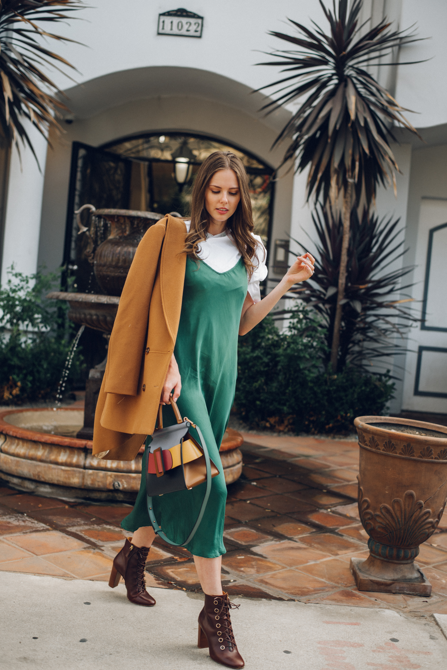 Alyssa Campanella of The A List blog shares why I limit what I post on social media wearing Boyy boutique Karl bag, Sezane James coat, and Sezane Pauline boots