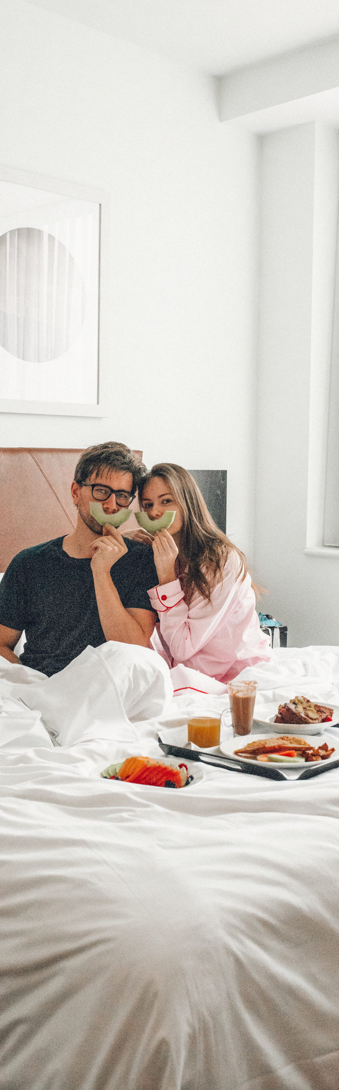Torrance Coombs and Alyssa Campanella of The A List blog stay at Hotel Place D'Armes for a weekend in Vieux-Montréal wearing Sleeper donut pajamas