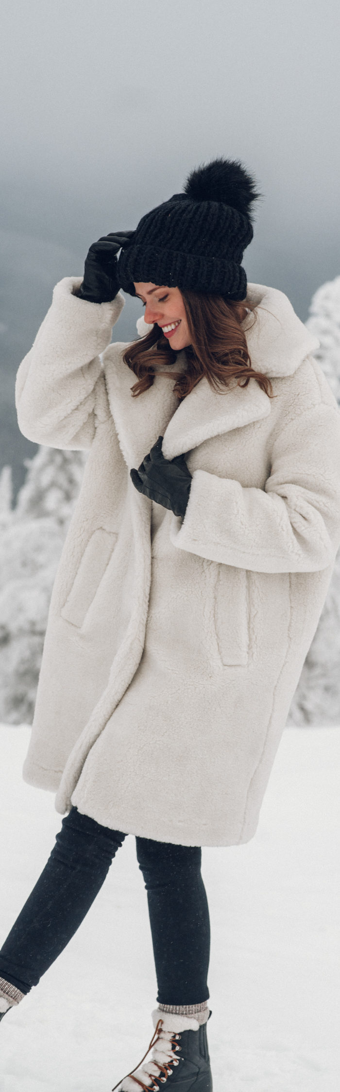 Alyssa Campanella of The A List blog visits Tremblant in Québec wearing And Other Stories faux fur coat