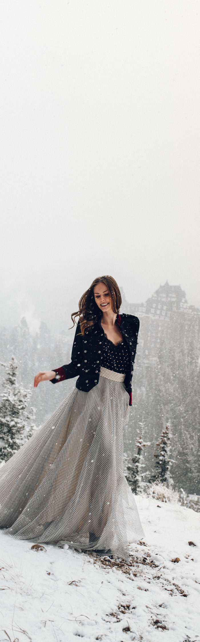 Alyssa Campanella of The A List blog experiences romance in the snow with her husband in Banff, Alberta, Canada at the Fairmont Banff Springs wearing Zimmermann Tempest ballet skirt