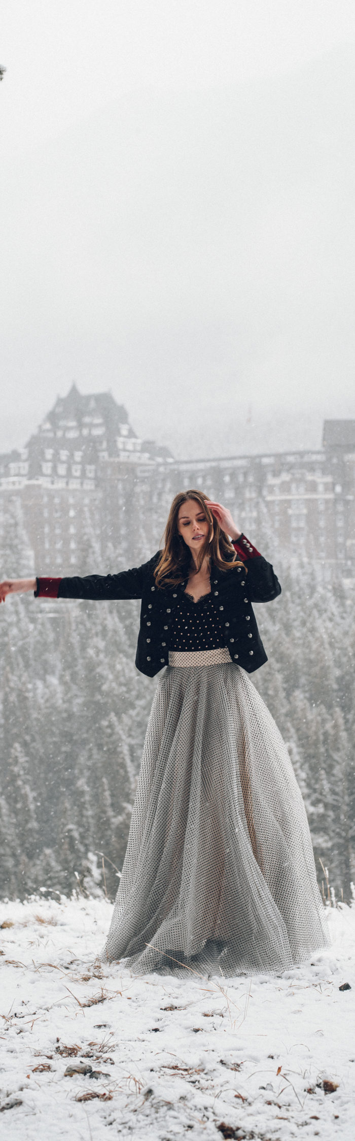 Alyssa Campanella of The A List blog experiences romance in the snow with her husband in Banff, Alberta, Canada at the Fairmont Banff Springs wearing Zimmermann Tempest ballet skirt
