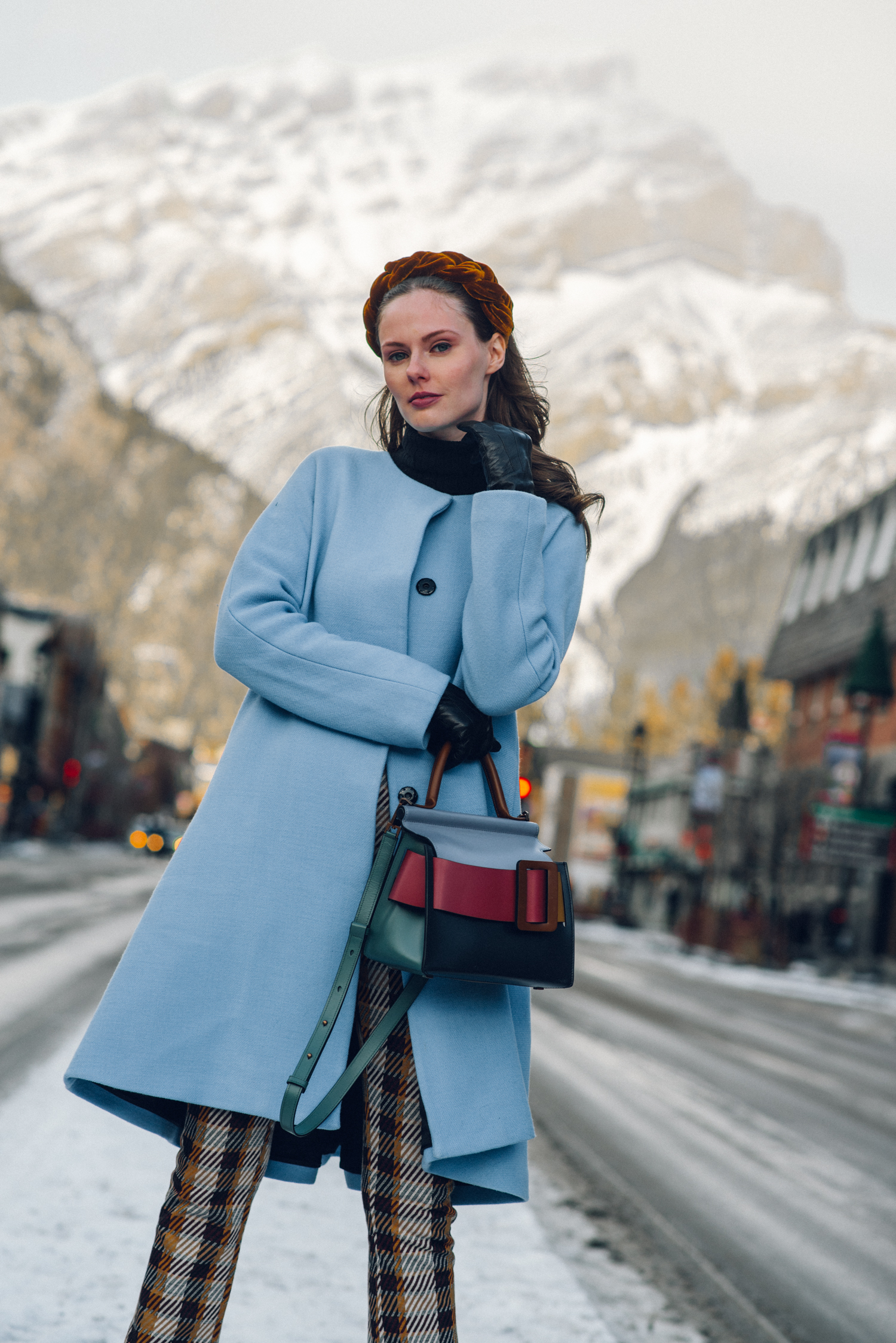 Alyssa Campanella of The A List blog experiences romance in the snow with her husband in Banff, Alberta, Canada wearing Jennifer Behr Lorelei headband and Boyy Boutique Karl bag