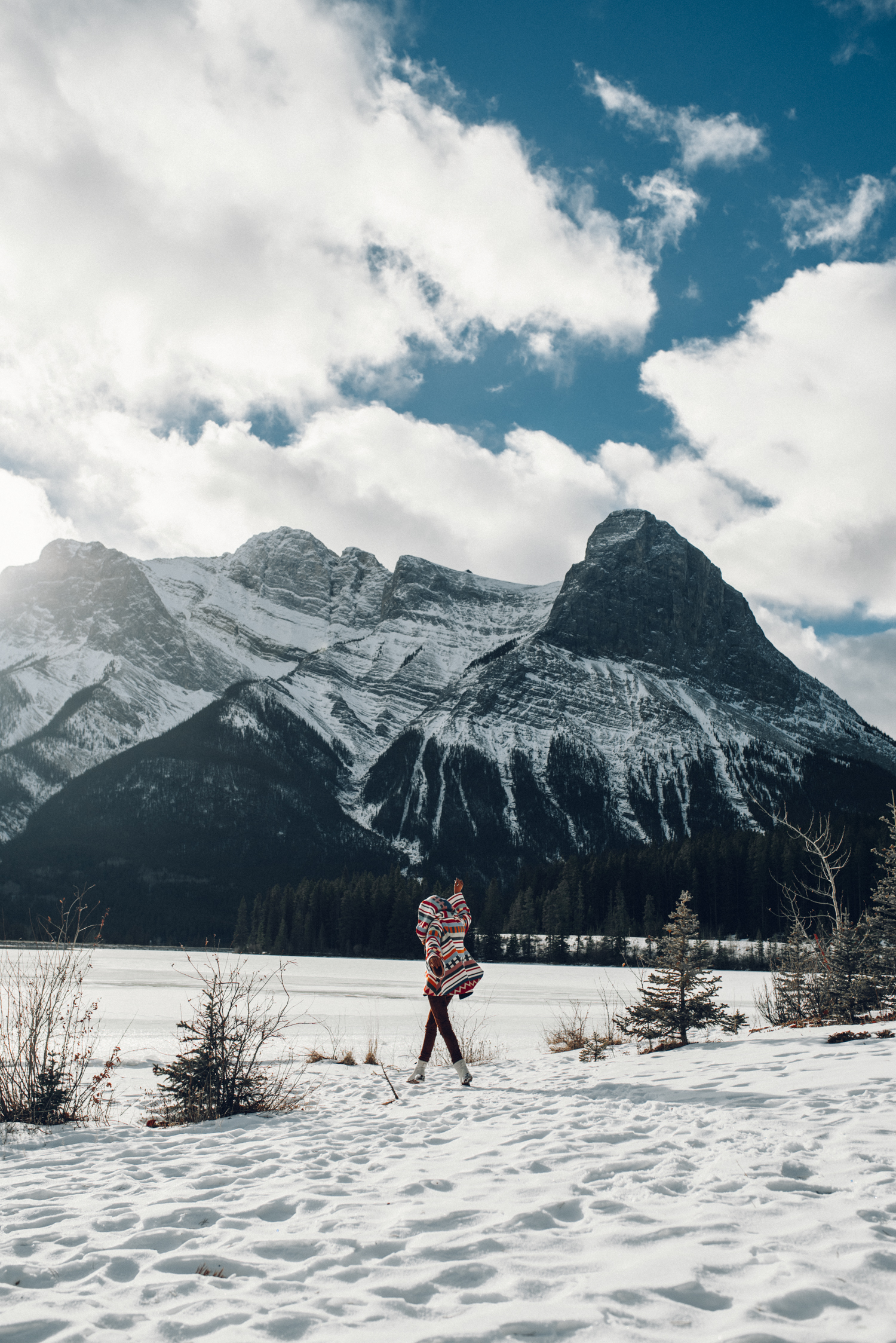 Alyssa Campanella of The A List blog wears Lindsey Thornburg cape and experiences romance in the snow with her husband in Alberta, Canada