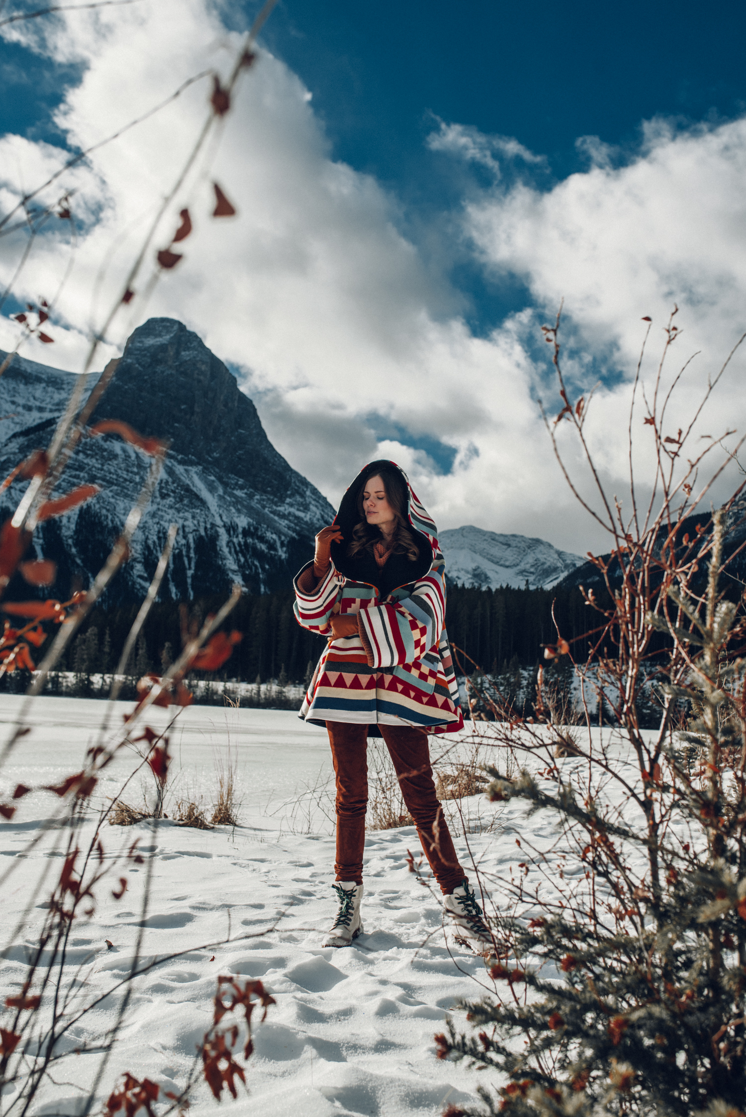 Alyssa Campanella of The A List blog wears Lindsey Thornburg cape and experiences romance in the snow with her husband in Alberta, Canada